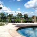 Perks Of Installing A Glass Pool Fence When Renovating Home Swimming Pools On The Sunshine Coast